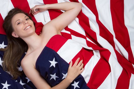 Beautiful smiling american flag girl