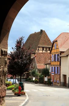 Typical colored houses in Alsace. Route des vines – France. Half-timbered wall.