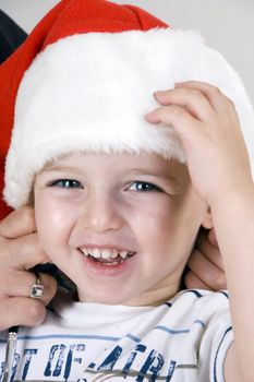 portrait of cute little boy with christmas hat