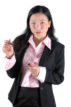 Chinese businesswoman holding pen, serious looks, wearing lady's suit and shirt. 