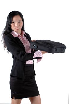 Chinese businesswoman, smiling and holding briefcase, laptop bag, wearing lady's suit and shirt. 