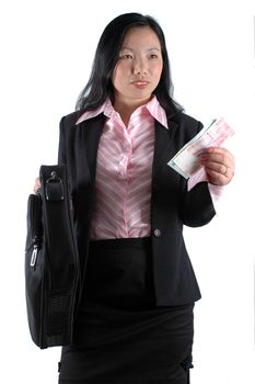 Pretty Asian businesswoman holding computer bag and Hongkong dollars, wearing lady's suit and shirt. 