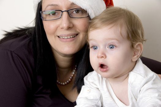 portrait of pleased mother and cute child