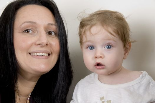 american mother and child looking at  the camera