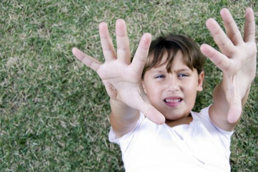 cute girl showing her palms to camera