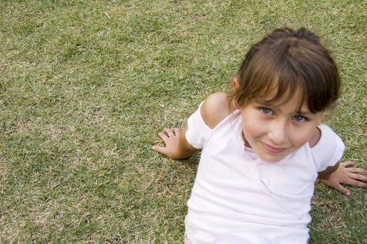 pretty happy young girl playing in the garden
