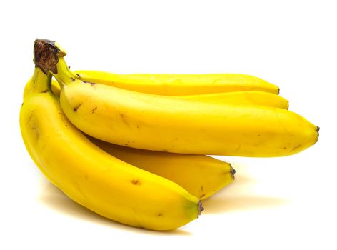 Ripe bananas on the white background. Shallow DOF