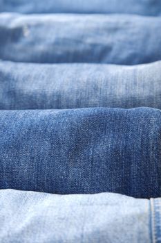 stack details of blue jeans, different textures and colors