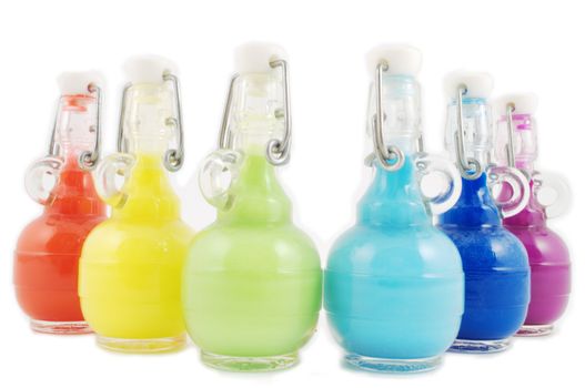 Colorful closed flask disposition, from red to purple