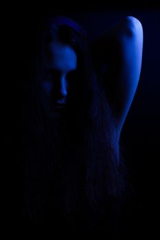 Woman's contour in blue tone.