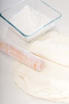 making fresh homemade pita bread ,with ingredients overa table