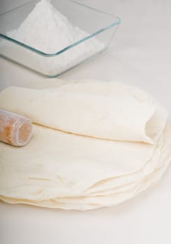 making fresh homemade pita bread ,with ingredients overa table