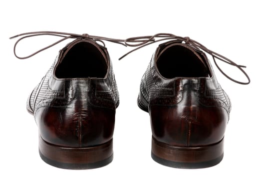 The classical brown man's shoes isolated on a white background.