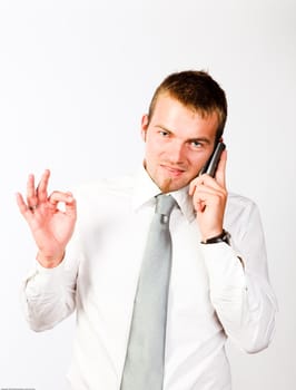 Young Corporate Man Having An Afirmative Attitude On The Phone
