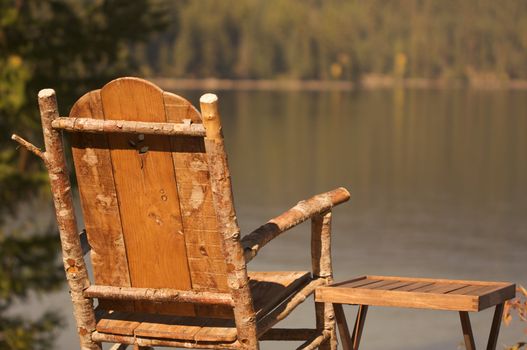 Tranquil Morning Lake Scene with Chair and Table