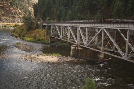 Iron Train Bridge Over Mountain River