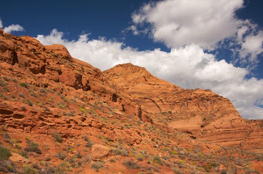 Red Rocks of Utah with Dramatic Blue Sky and Clouds
