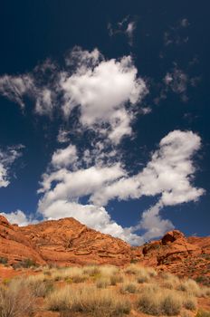 Red Rocks of Utah with Dramatic Blue Sky and Clouds