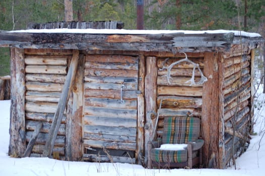 cottage with chair outside