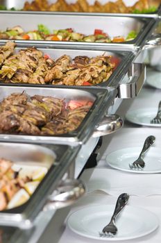 metallic banquet meal trays served on tables