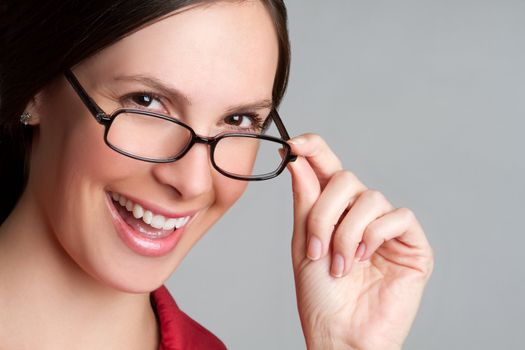 Beautiful happy woman wearing glasses