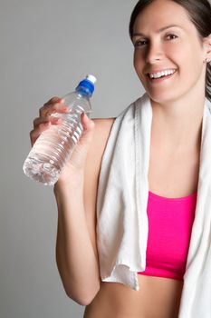 Fitness woman drinking water