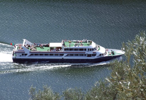 Tourism boat going down the river