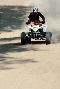 Man on quad bike during a race