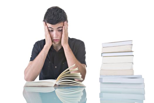 Portrait of a stressed young student with a pile of books to read.