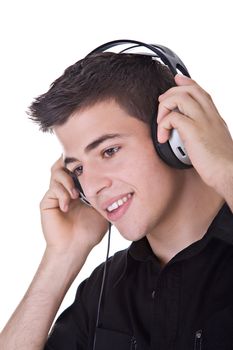 Young man, enjoying music with headphones. Isolated on white.