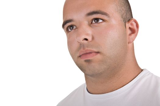 Portrait of a young man with pensive expression. Isolated on white. Studio Shot.