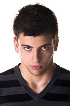 Portrait of a young man with a tough expression. Studio shot. Isolated on white background.