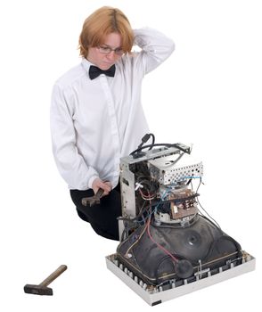 The girl repairing the old electronic equipment