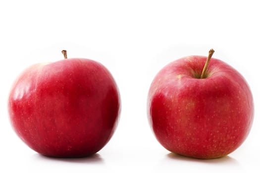 two red apples isolated on white background