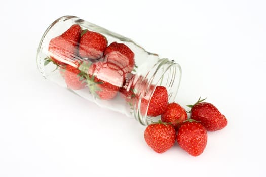 Strawberries in jar isolated on white background