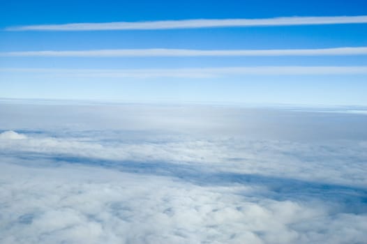 Aerial photo, showing beautiful skyscape. Blue sky covered with differnet clouds.