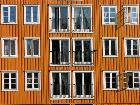 Orange/brown Window pilework over a canal