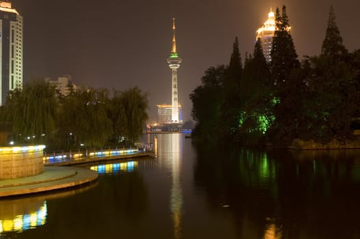 Nightscape of Nantong city, Jiangsu province, China. Wonderful cityscape with famous Haohe river. 
