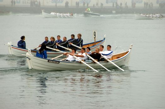Faroese rowing championship finale at Olavs�ku (St. Olav's day) in Torshavn. The boats are the same type as the vikings used.