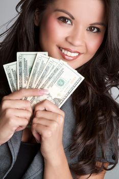 Smiling woman holding money