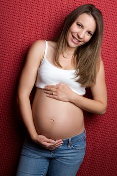 Beautiful happy young pregnant girl