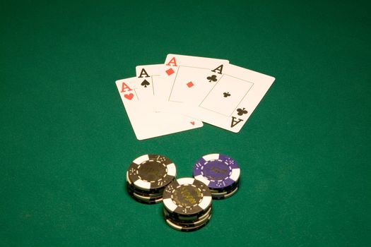 Four aces on the green table in casino Las Vegas