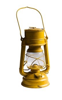 Yellow Kerosene lamp or paraffin lamp isolated on white. Clipping path included