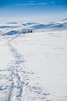 A group of skiers resting. Picture taken in Oppdal, Norway.