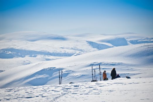 A group of skiers resting. Picture taken in Oppdal, Norway.