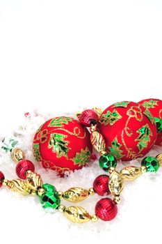 Christmas tree decorations on a white snowy background