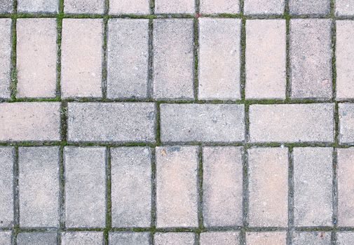 Old paving blocks (stones) - street pavement background (texture).