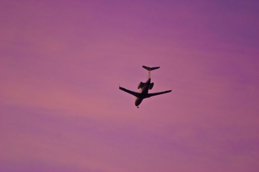 transportation series: jet in the sunset sky