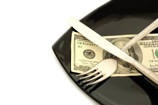 expensive food concept - black plate and dollars on it