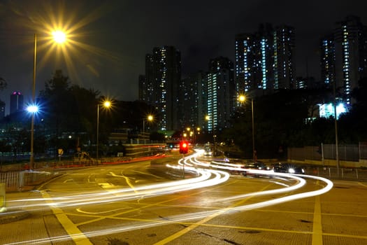 High traffic road with motion blurred automobile